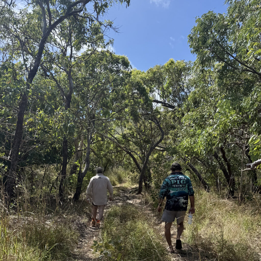 Tony Matchett and Director Woibo walking original location of Hope Vale